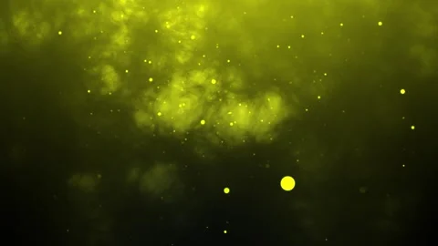 Yellow particles floating in a dark space with bright lights Stock Footage 333520514