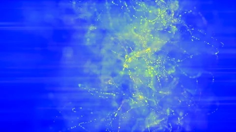 Yellow particles moving in deep blue water Stock Footage 245501219