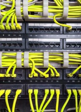Yellow patch cord internet cables Stock Photos