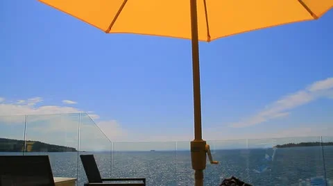Yellow Patio Umbrella Stock Footage 15532476