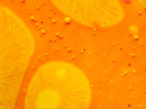 Yellow pattern and bubbles on abstract background. Close up macro shot. Blurred 写真素材