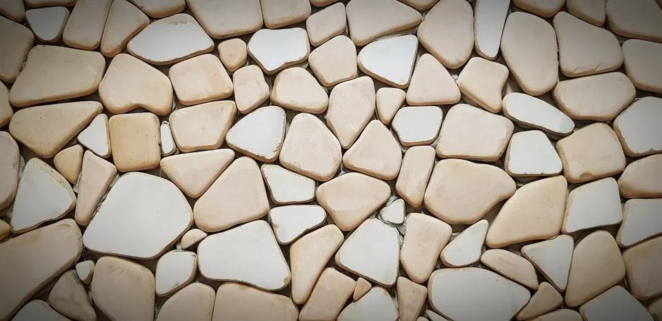 Yellow pattern of stone wall for background in vintage tone. Art and Textured Stock Photos