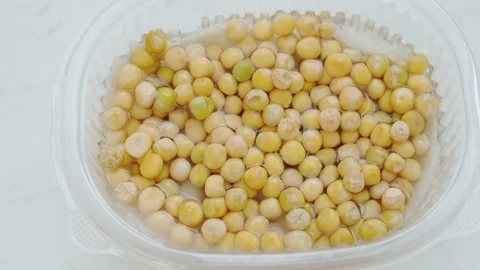Yellow pea seeds soaked Stock Footage 175224344