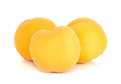 Yellow peach isolated on the white background Stock Photos