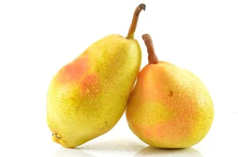 Yellow pears on a white background Stock Photos