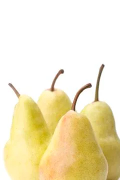 Yellow pears on a white background. Stock Photos