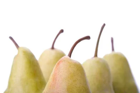 Yellow pears on a white background. Stock Photos