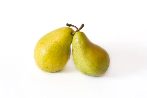 Yellow pears on a yellow background Stock Photos