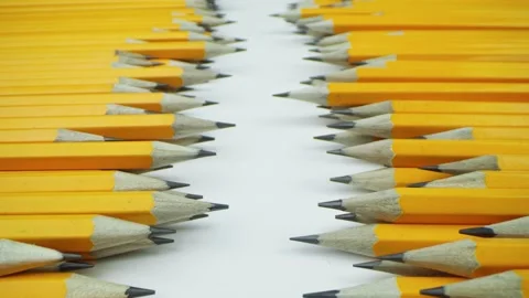 Yellow pencils randomly lie on a white background Stock Footage 140448102