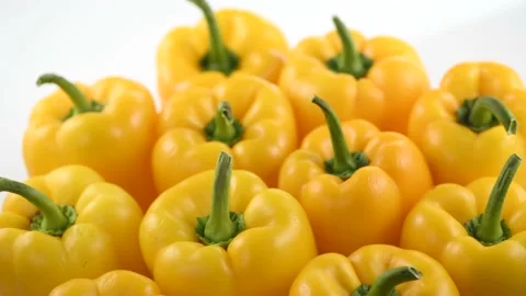 Yellow pepper close up, rotating on white background. Stock Footage 226405042