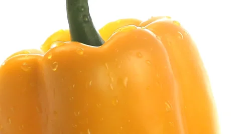 Yellow pepper rotates into and out of frame Stock Footage 46586140