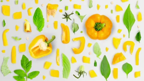 Yellow Pepper Slice and Leaf Collection Stock-Footage 202002080