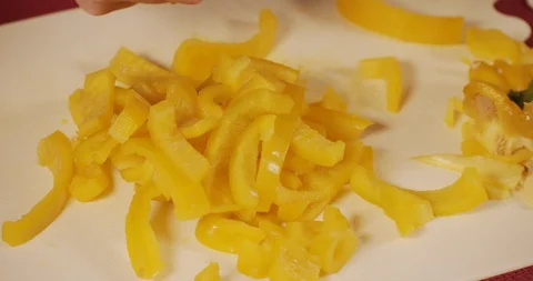 Yellow pepper sliced on the cutting board Stock Footage 129063967