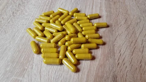 Yellow Pills Stock Footage 130511095