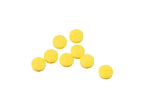 Yellow pills isolated Stock Photos