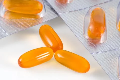 	Yellow pills  Stock Photos
