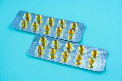 Yellow pills Stock Photos