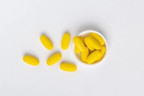 Yellow pills Stock Photos
