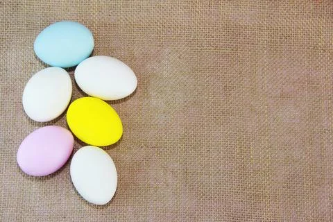 Yellow, pink, blue easter eggs Stock Photos