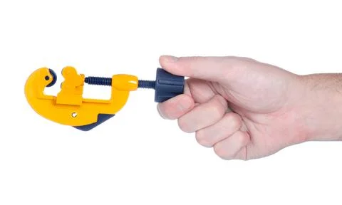 Yellow pipe cutter in hand Stock Photos