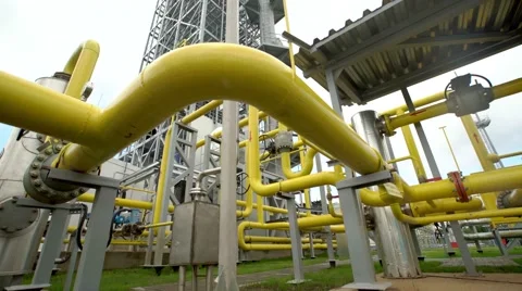 Yellow pipe on gas plant. shot with slider Stock Footage