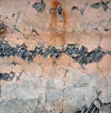 Yellow plastered wall. Texture with plaster stains Stock Photos