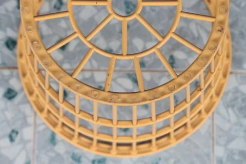 Yellow plastic basket. Stock-Fotos