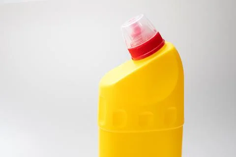 Yellow plastic container with red cap Stock Photos