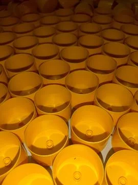 Yellow-plastic-cylinders-pattern-01 Stock Photos