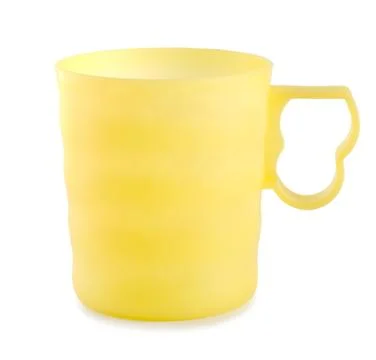 Yellow plastic mug Stock Photos