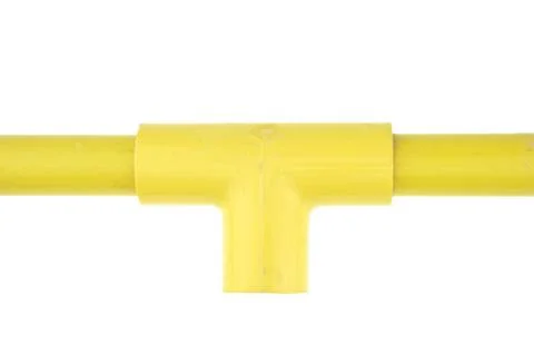 Yellow plastic pipe with joint three way isolated Stock Photos