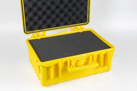 Yellow plastic protective case for the camera against a white background. Stock Photos