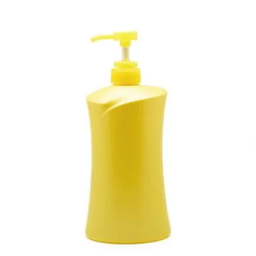 Yellow plastic pump bottle Stock Photos