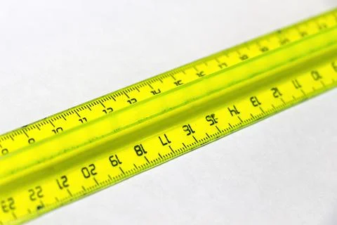 Yellow plastic ruler Stock Photos
