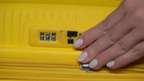 Yellow plastic suitcase. Baggage or hand luggage bag. Open or close with zipper. Stock Footage 171091788