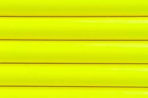 Yellow plastic tubing pattern texture background Stock Photos