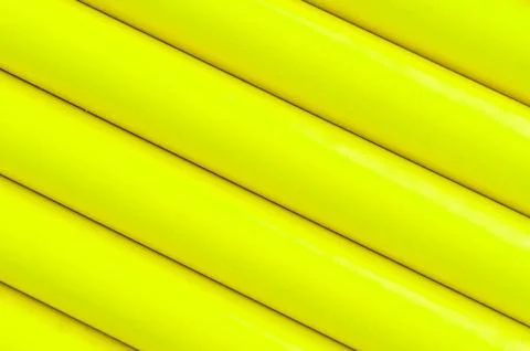 Yellow plastic tubing pattern texture background Stock Photos