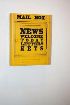 Yellow post box mailbox for mail letter Foto stock