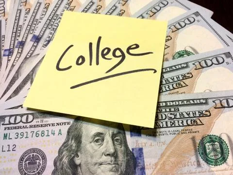 Yellow Post it note with handwritten word college on money Stock Photos