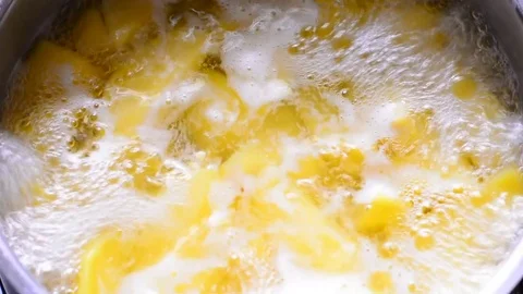 Yellow potatoes boiling. Stock Footage 75343488