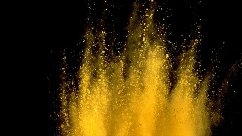 Yellow powder explosion on black background in slow motion. Video stock 122439403