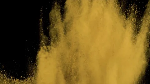Yellow powder explosion in slow motion engulfing screen 動画素材 122454699
