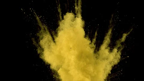 Yellow powder explosion in slow motion with acceleration in vertical motion Stock Footage 122462238