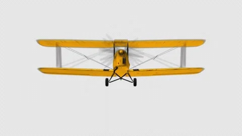 A yellow propeller plane flying right past me (with Alpha Channel) Stock Footage 332928709