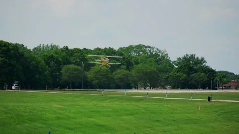 Yellow Propeller plane is flying at the small airport. Stock-Footage 304392072