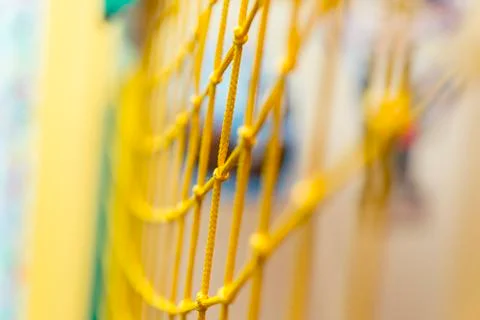 Yellow protective net with selective focus. Stock Photos
