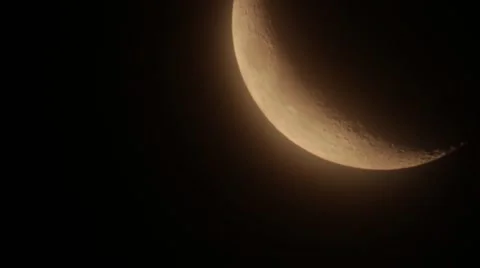 Yellow quarter moon moving on dark sky Stock Footage 63467187