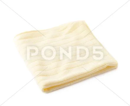 Yellow rag over white isolated background Stock Photos