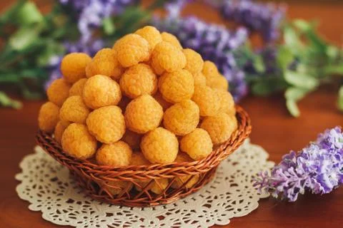 Yellow raspberry with lavander Stock Photos