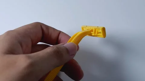 Yellow razor with a sharp blade Stock Footage 240602103